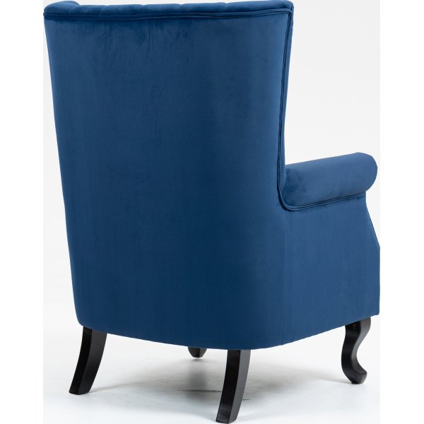 Öronlappsfåtölj i blått sammet Öronlappsfåtölj i blått sammet