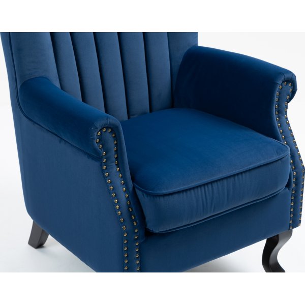 Öronlappsfåtölj i blått sammet Öronlappsfåtölj i blått sammet