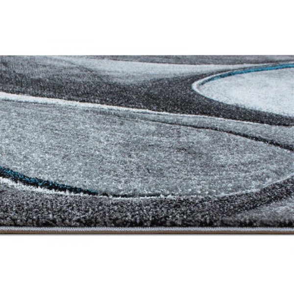 Machinaal geweven vloerkleed Arvel - Turkoois