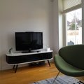 Fåtölj Worthington och Hugo TV-bänk Fåtölj Worthington grön